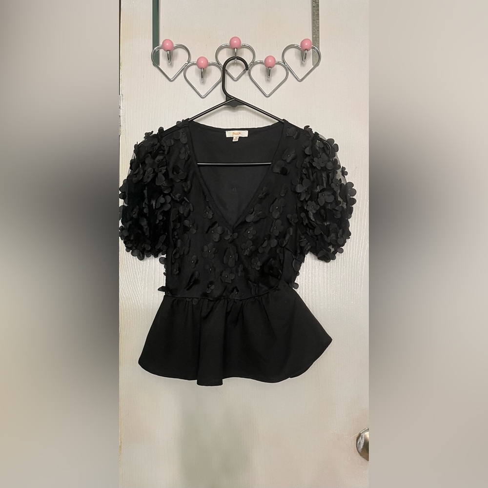 Black floral blouse